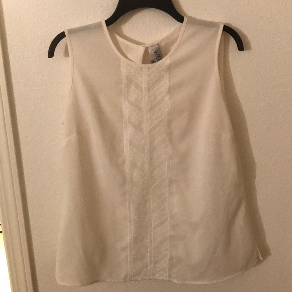 White sleeveless blouse